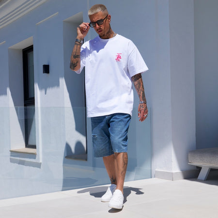 Bee Inspired Garnacho Jean Shorts in Mid Blue, heavyweight denim shorts with rip detailing and a raw hem, styled shot
