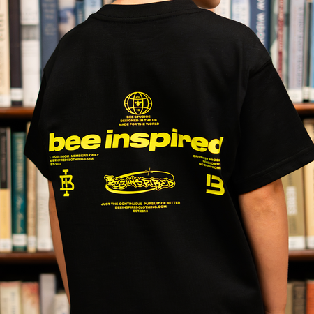 Junior Ajer T-Shirt in black and yellow showing the regular fit
