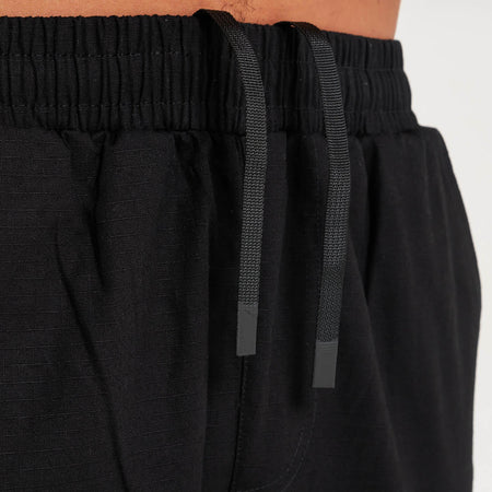 Bee Inspired Medel Cargo Pant in Black, regular fit cargo trousers with a side zip pocket, back view