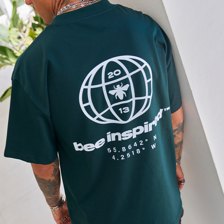 Bee Inspired Mata Oversized T-Shirt in Pine Green, oversized tee with a bold rear graphic print, styled shot