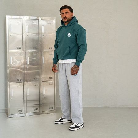 Bee Inspired Guedes Hoodie in Teal/White, styled shot