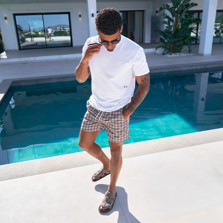 Bee Inspired Periera Swim Shorts in Multi, lightweight swim shorts with a bold multi colour print, styled shot
