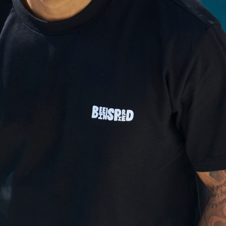 Bee Inspired Aguirre Oversized T-Shirt in Black/Blue, oversized fit tee with a raised print across chest and back, close-up