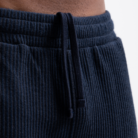 Bee Inspired Ake Short in Dark Navy, relaxed fit shorts with subtle branding, back view