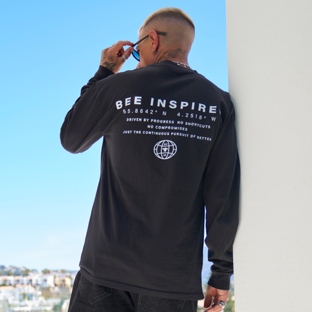 Bee Inspired Alonso Long Sleeve Top in Faded Black, relaxed fit long sleeve graphic tee with a faded wash, front view