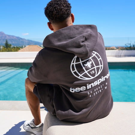 Mata Full Zip Hoodie in faded black showing the oversized fit