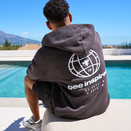 Bee Inspired Mata Full Zip Hoodie in Faded Black, relaxed fit full zip hoodie with a graphic print, back view
