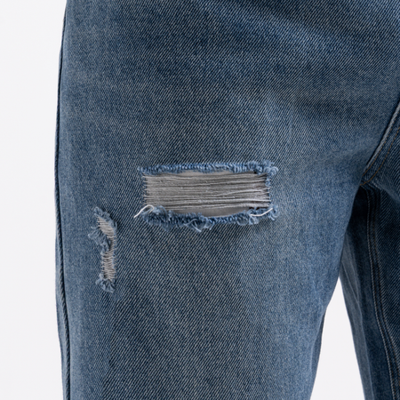 Bee Inspired Garnacho Relaxed Jeans in Mid Blue, heavyweight denim jeans with rip detailing for a worn-in look, styled shot