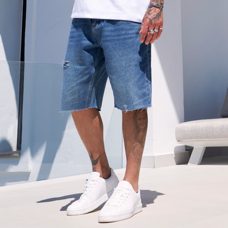 Bee Inspired Garnacho Jean Shorts in Mid Blue, heavyweight denim shorts with rip detailing and a raw hem, front view