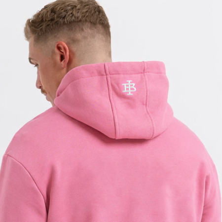 Bee Inspired Guedes Hoodie in Bubblegum Pink, hoodie with a clean embroidered BI monogram graphic, close-up crop shot