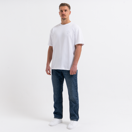 Bee Inspired Guedes T-Shirt in White/White, tee with a clean embroidered BI monogram graphic, close-up crop shot