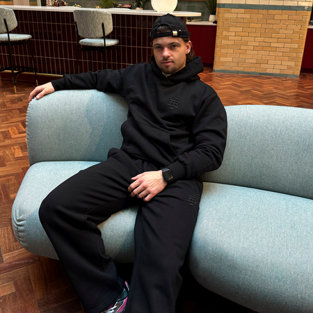 Bee Inspired Guedes Jogpant in Black, jogpants with a clean embroidered BI monogram, styled lifestyle shot