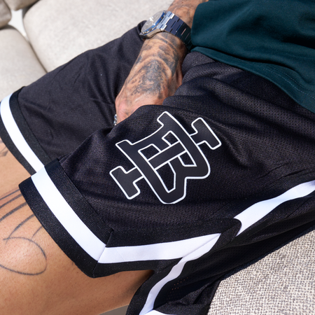 Bee Inspired Guedes Mesh Shorts in Black, breathable mesh shorts built for comfort and movement, back view