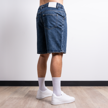 Bee Inspired Gueye Denim Short in Mid Blue, relaxed fit denim shorts with a carpenter pocket and belt loops, close-up