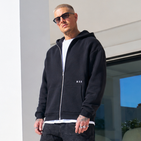 Bee Inspired Initial Zip Hoodie in Black, relaxed fit zip hoodie, part of the B33 Foundations range, front view