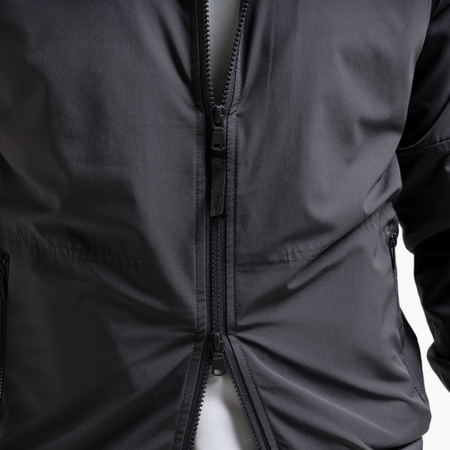 Bee Inspired Juranovic Jacket in Charcoal, lightweight jacket with adjustable hood and neckline toggles, front view