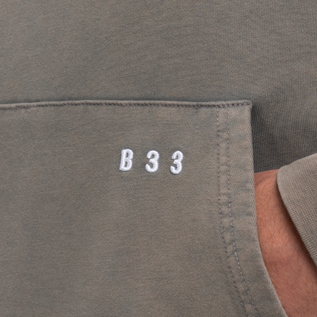 Bee Inspired Kubo Hoodie in Field Green, relaxed fit hoodie with a soft, breathable feel, close-up