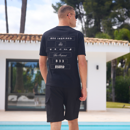 Legacy Logo T-Shirt in black with embroidered fabric on the chest and back, further view