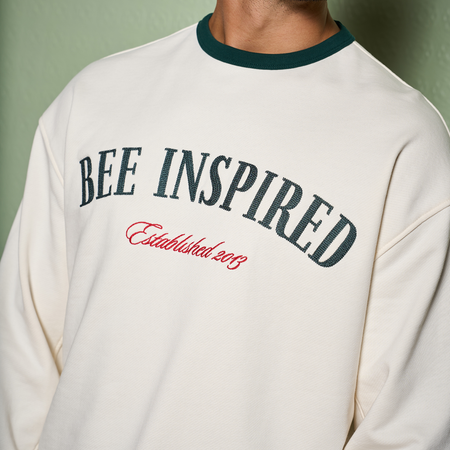 Bee Inspired Willock Crew in Off-White, relaxed fit crew sweatshirt with a collegiate look, styled lifestyle shot