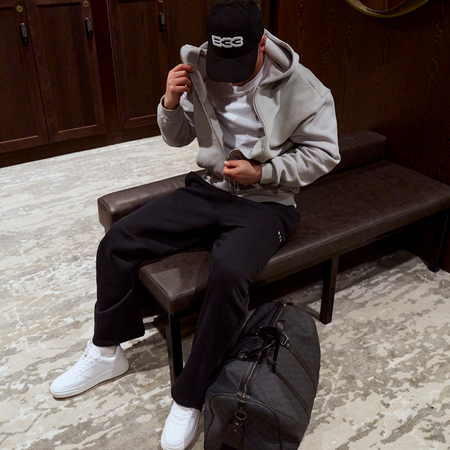 Bee Inspired Initial Jogpant in Black, relaxed fit jogpants, part of the B33 Foundations range, styled lifestyle shot