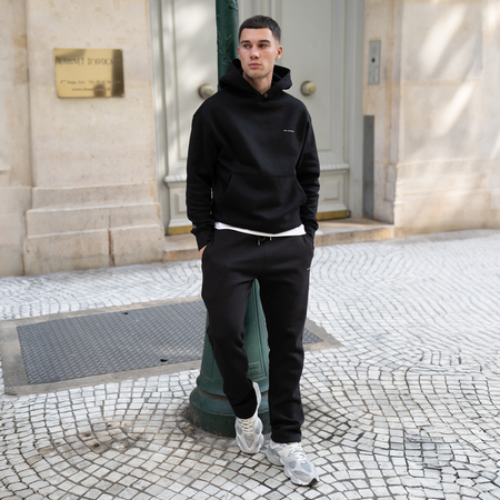 Bee Inspired Diallo Hoodie in Black, relaxed fit hoodie designed for easy layering, styled lifestyle shot