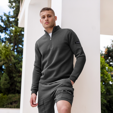Bee Inspired Klose 1/4 Zip in Charcoal, slim fit quarter-zip with stretch cuffs and sleeve panelling, close-up crop shot