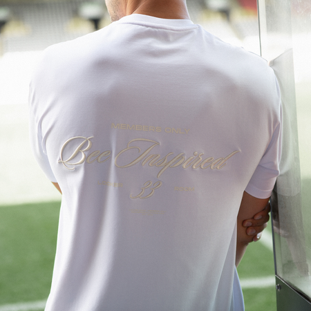 Bee Inspired Team T-Shirt in White, tee with mixed embroidery and print graphic detailing, styled lifestyle shot