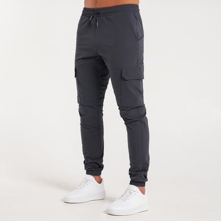 Rivero Tech Cargo Pants in charcoal with stretch ankle cuffs