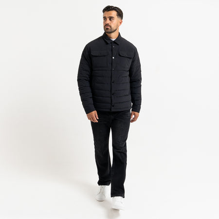 Siegrist Jacket in black, focusing on a padded collared design