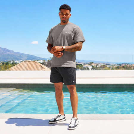 Bee Inspired Simms Swim Shorts in Black, lightweight swim shorts with a quick-dry, summer-ready fit, close-up
