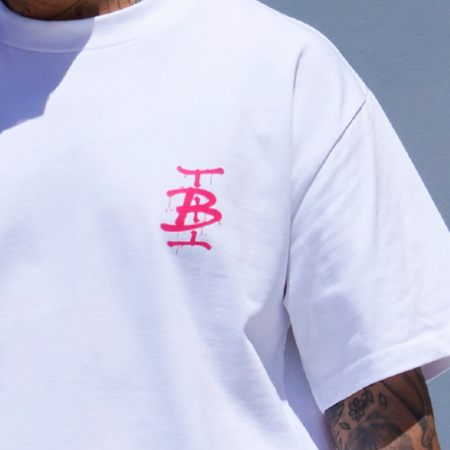 Bee Inspired Tonali Oversized T-Shirt in White/Pink, oversized tee with a graffiti-style BI monogram print, close-up
