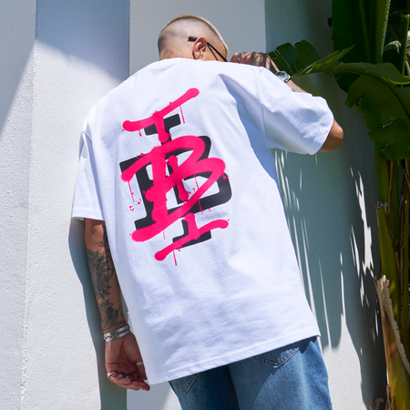 Bee Inspired Tonali Oversized T-Shirt in White/Pink, oversized tee with a graffiti-style BI monogram print, front view