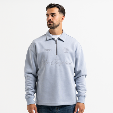 Bee Inspired Zico Zip Polo in Blue, long sleeve collared polo with a quarter-zip neckline, front view