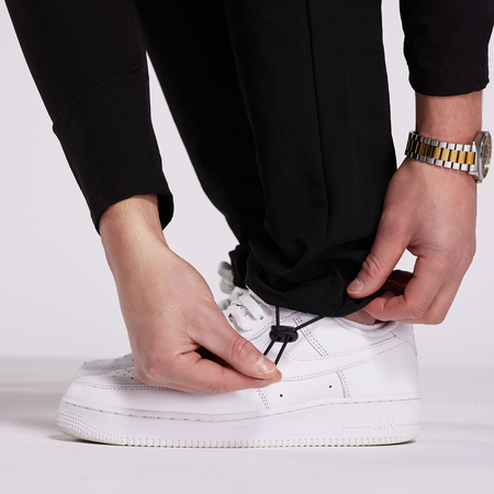 Bee Inspired Guardiola Cargo Pants in Black, regular fit cargo trousers with utility pockets and metal D-ring pulls, close-up