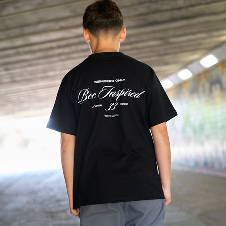 Bee Inspired Junior Team T-Shirt in Black, heavyweight cotton junior tee with dropped shoulders, styled lifestyle shot
