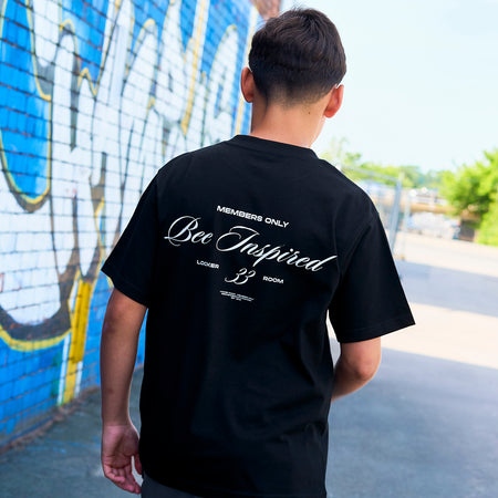 Bee Inspired Junior Team T-Shirt in Black, heavyweight cotton junior tee with dropped shoulders, styled lifestyle shot