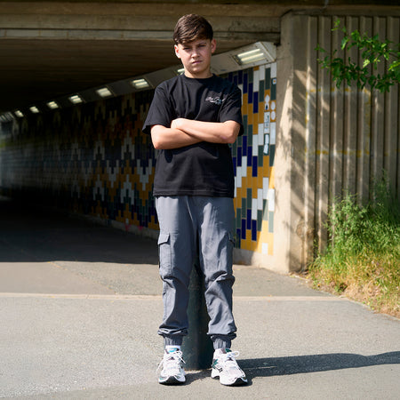 Bee Inspired Junior Team T-Shirt in Black, heavyweight cotton junior tee with dropped shoulders, styled lifestyle shot