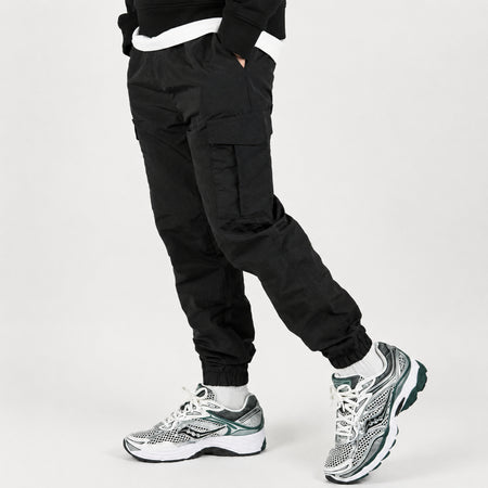 Bee Inspired Junior Madueke Cargo Pants in Black, regular fit junior cargo trousers with utility pockets and stretch cuffs