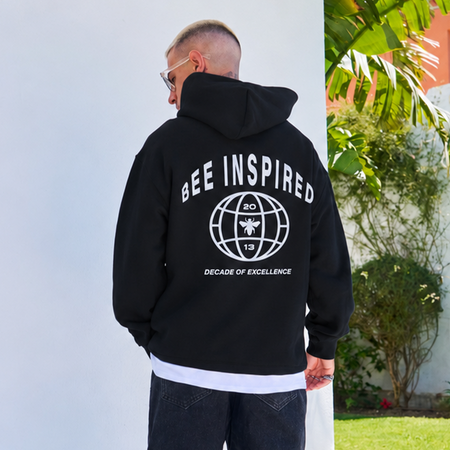 Bee Inspired Sagna Hoodie in Black, relaxed fit hoodie with a bold back graphic, front view