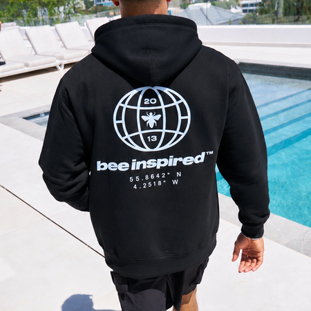Bee Inspired Mata Hoodie in Black, oversized hoodie with a bold rear graphic print, front view
