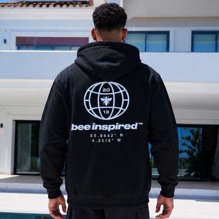 Bee Inspired Mata Hoodie in Black, oversized hoodie with a bold rear graphic print, close-up