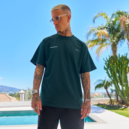 Bee Inspired Mata Oversized T-Shirt in Pine Green, oversized tee with a bold rear graphic print, front view