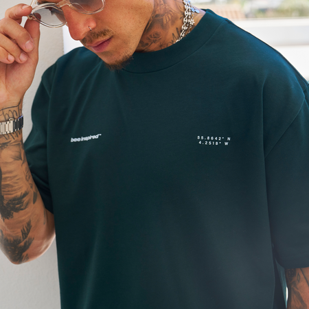 Bee Inspired Mata Oversized T-Shirt in Pine Green, oversized tee with a bold rear graphic print, back view
