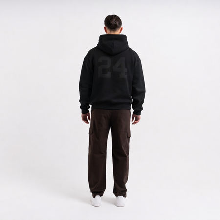 Bee Inspired Heartbreaker Club Blackout Hoodie in Black, relaxed fit hoodie in a luxury streetwear style, styled shot