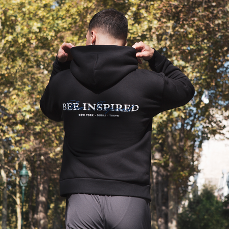 Bee Inspired Stach Hoodie in Black, relaxed fit hoodie with a kanga pocket and stretch cuffs, styled lifestyle shot