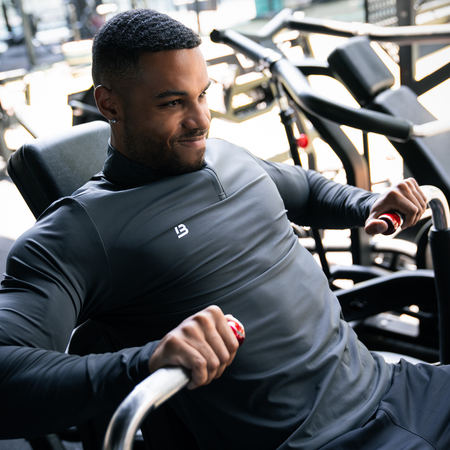 Bee Inspired Signature Sports 1/4 Zip in Charcoal, quarter-zip sports top with a thumb hole in the sleeve
