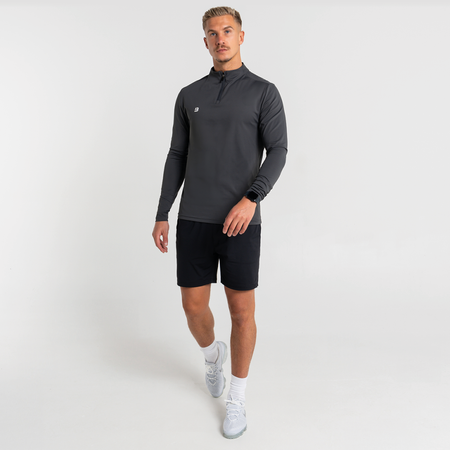 Bee Inspired Signature Sports 1/4 Zip in Charcoal, quarter-zip sports top with a thumb hole in the sleeve, styled shot