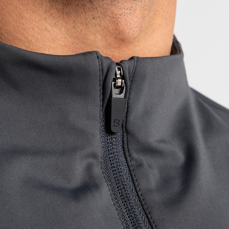 Bee Inspired Signature Sports 1/4 Zip in Charcoal, quarter-zip sports top with a thumb hole in the sleeve, back view