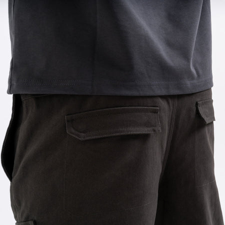 Bee Inspired Verdi Cargo Pant in Charcoal, relaxed fit carpenter-style cargo trousers with a drawcord waistband, front view