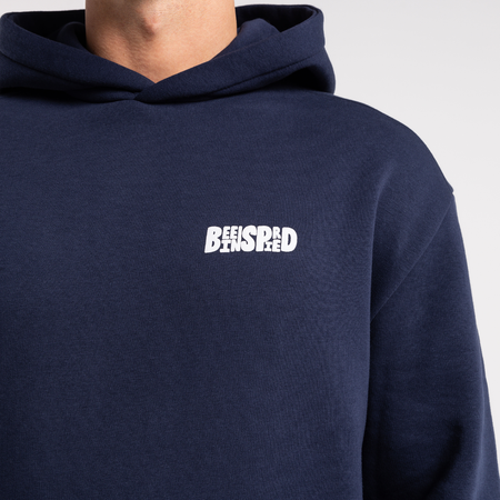 Bee Inspired Aguirre Hoodie in Navy, relaxed fit hoodie with a raised graphic print and kanga pocket, alternate angle
